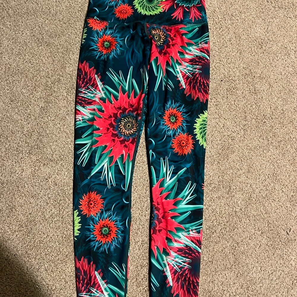 Women’s silky, bright, colored leggings size small